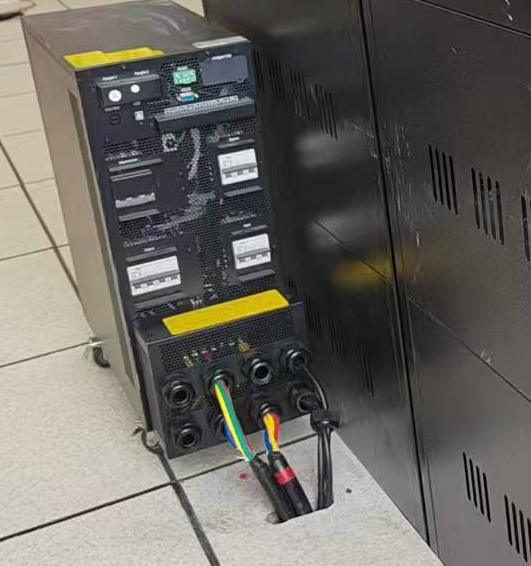 Close-up of UPS equipment and cable connections